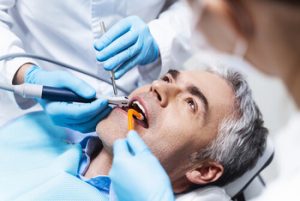 Dental Implants Vs Dentures application